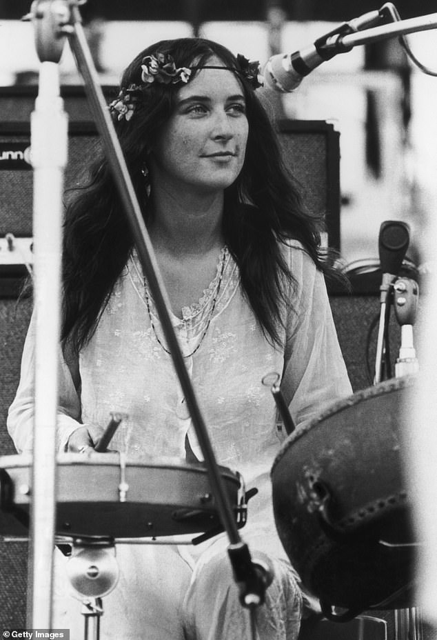 Licorice McKechnie performing at Woodstock in 1969, wearing flowers in her hair