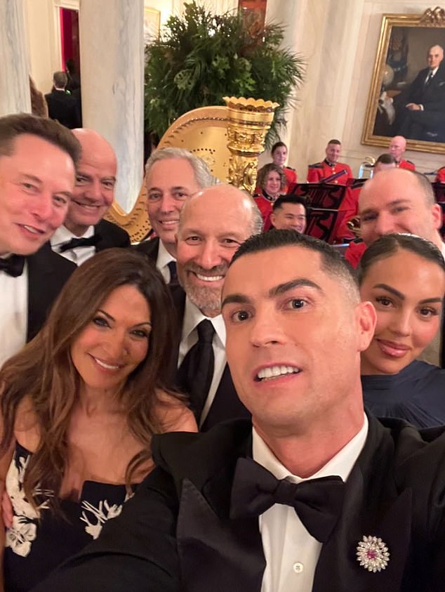 Cristiano Ronaldo takes a selfie at the White House with Elon Musk, Gianni Infantino, David Sacks, Allison and Howard Lutnick, Georgina Rodriguez, and Greg Brockman