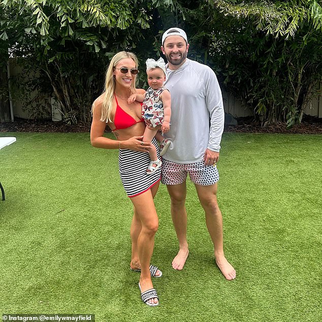 Baker Mayfield with wife Emily and daughter Kova; the couple announced they’re expecting a baby boy in April 2026.