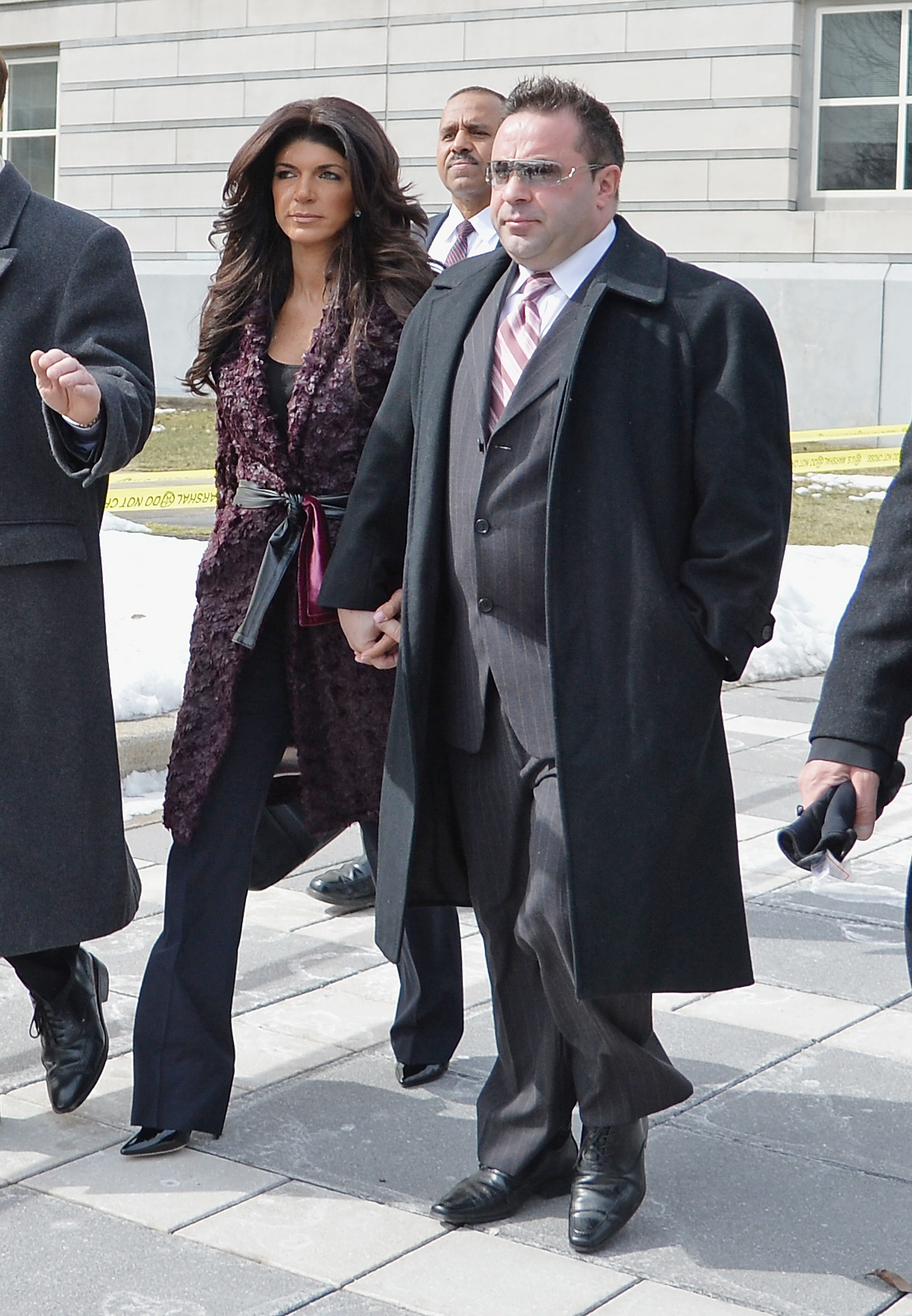 Joe Giudice, who served time at FCI Fort Dix, leaves court with Teresa Giudice; he recently described the facility's conditions in an interview.