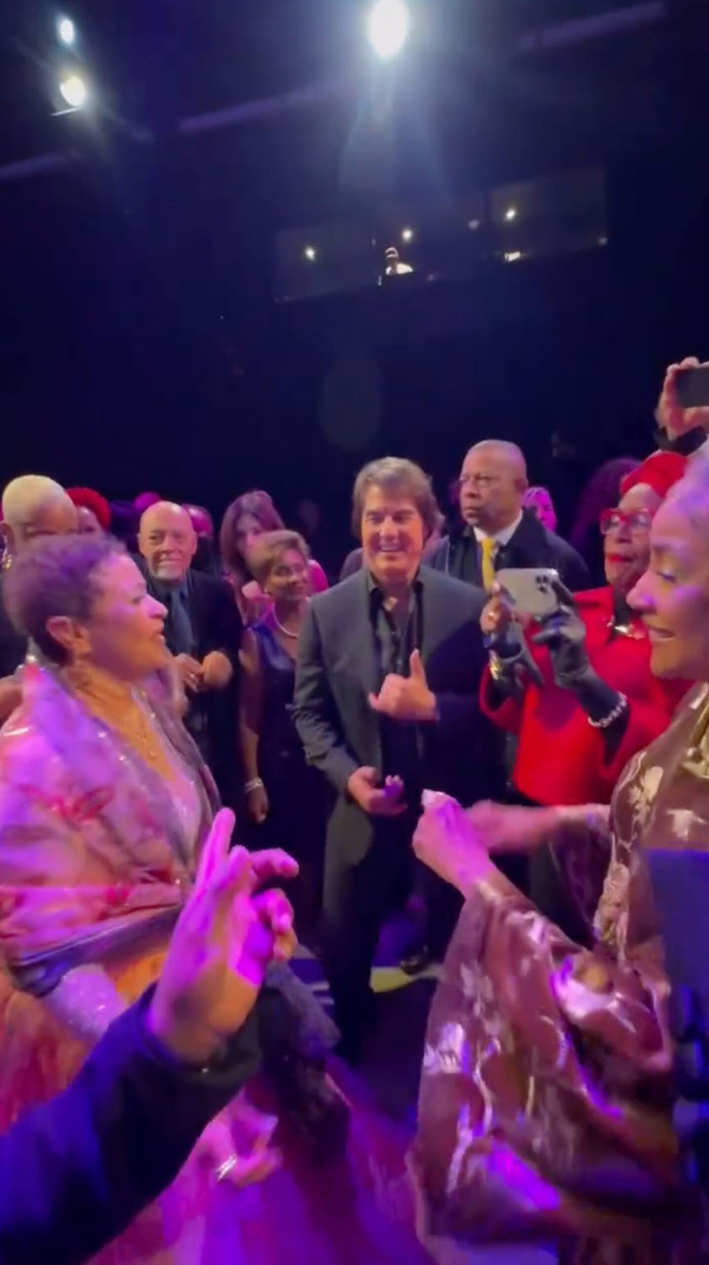 Tom Cruise dances with Debbie Allen as Jennifer Lewis and Phylicia Rashad join to Luther Vandross’ “Never Too Much.”