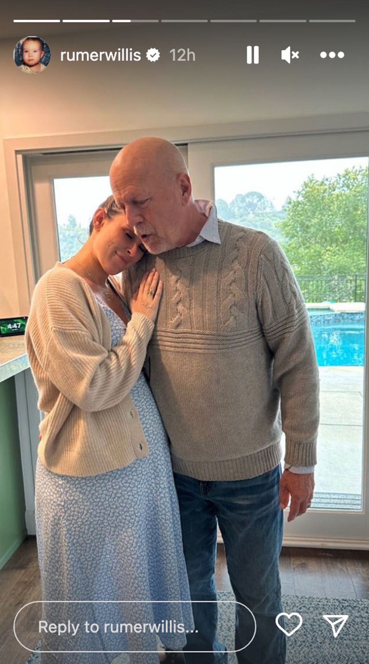 Pregnant Rumer Willis embracing her father, Bruce Willis.