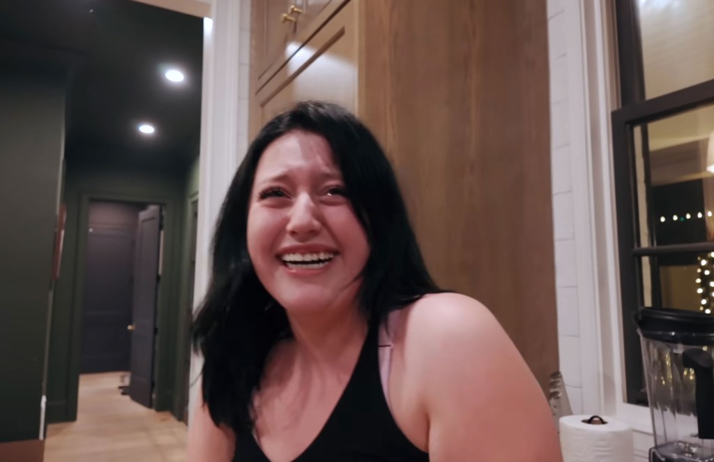 Bailee Ann laughs and backs away after seeing Jelly Roll's freshly shaved face.