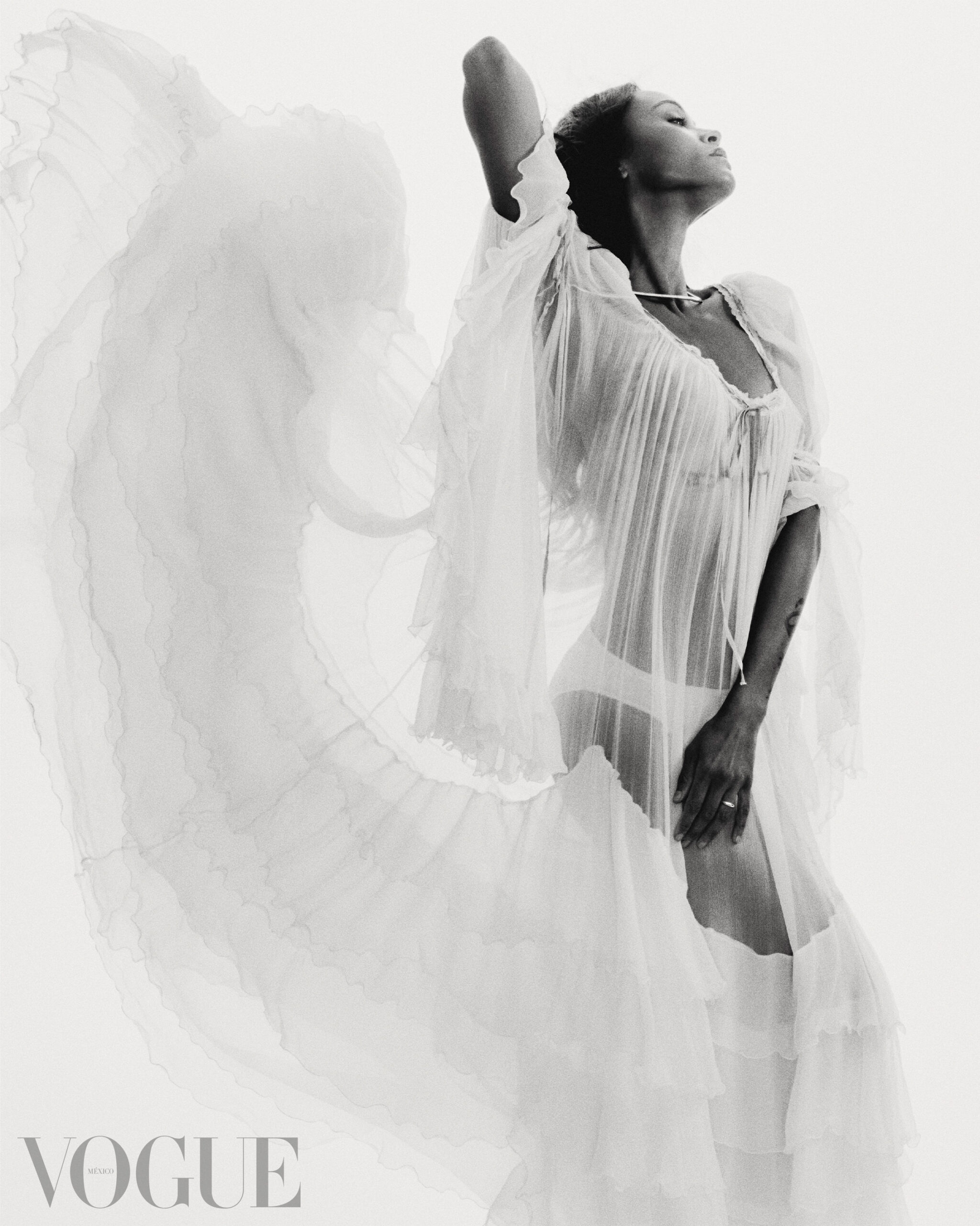 Zoe Saldana wearing an ethereal sheer Chloe dress.