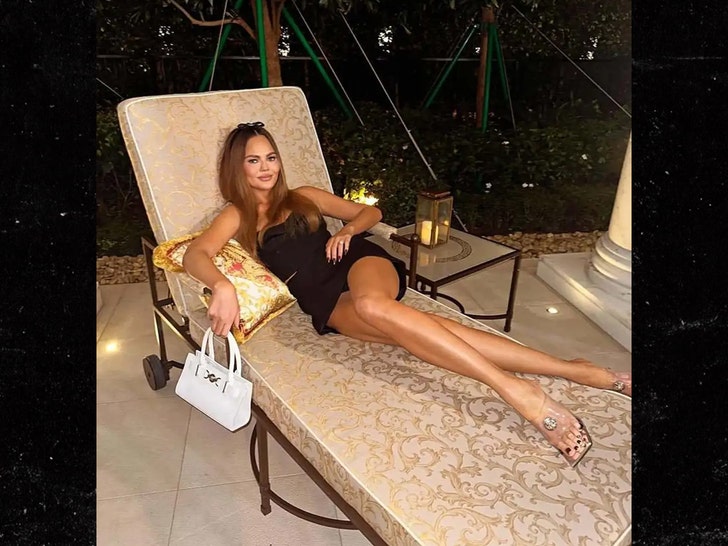 Chrissy Teigen in a sunlit selfie