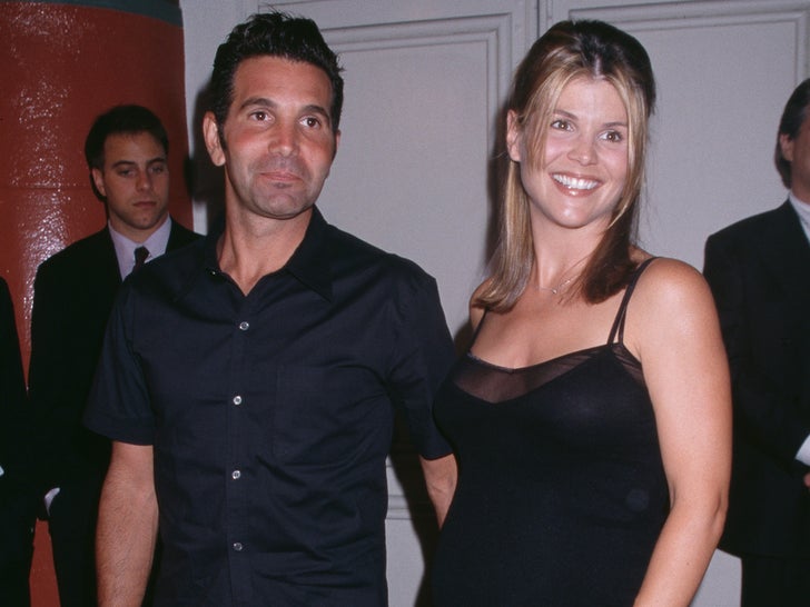 Lori Loughlin and Mossimo Giannulli pictured together