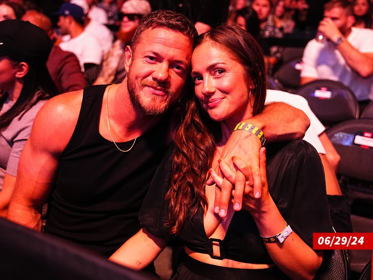 Minka Kelly and Dan Reynolds together at an event (Getty)