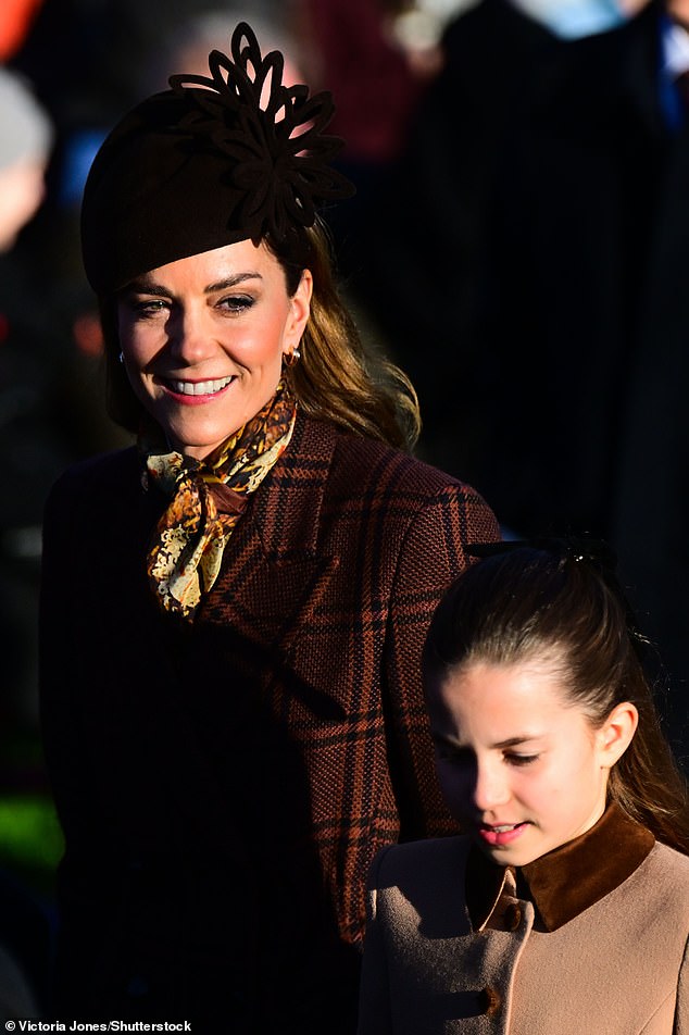 Kate smiles warmly at Princess Charlotte as they arrive for the Sandringham Christmas service