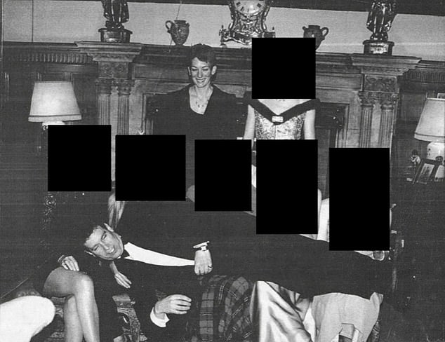 Photo from DOJ release appearing to show Prince Andrew lying across several women at a formal event; identities were not captioned by DOJ.