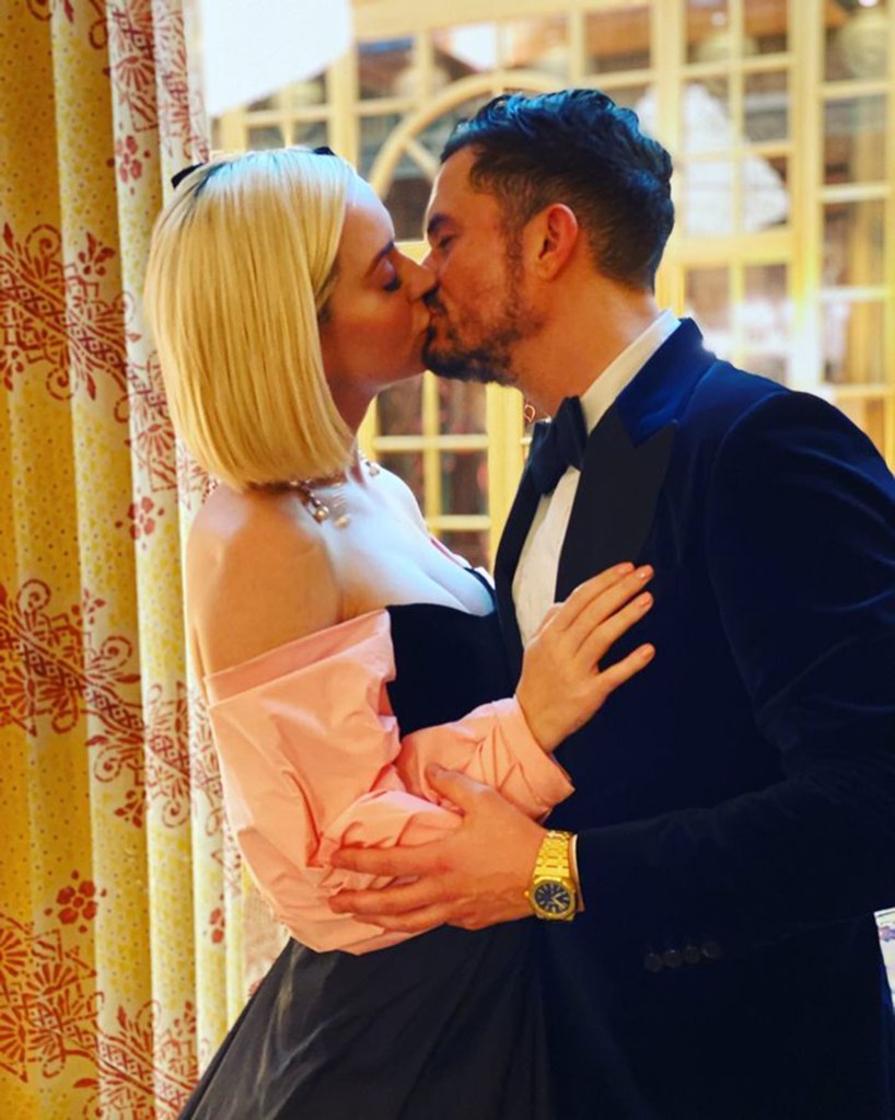 Katy Perry and Orlando Bloom kissing; Brand said he was 'OK with Orlando Bloom.'