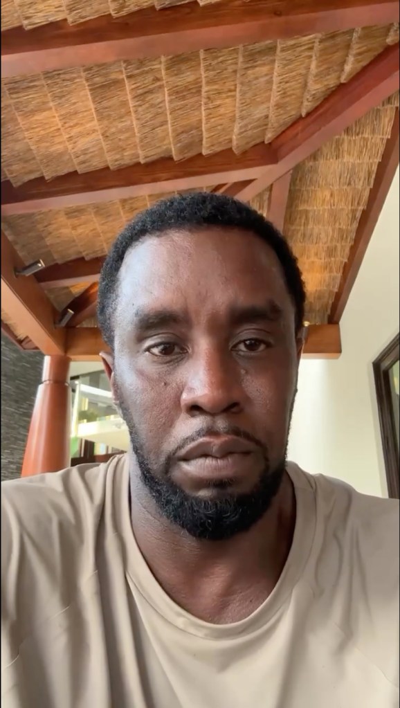 Sean "Diddy" Combs in a still from a Netflix docuseries, looking directly at the camera.