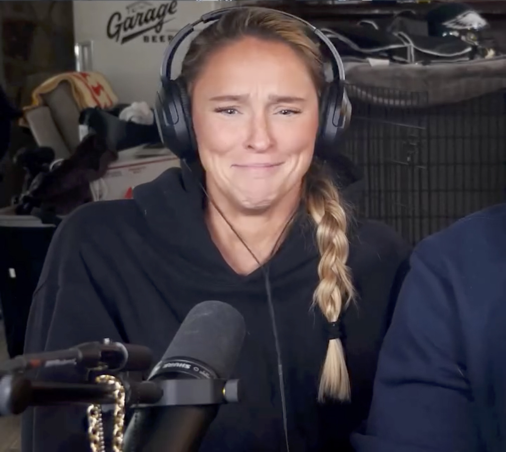 Kylie Kelce recording the New Heights podcast, reacting to Travis Kelce's 'we never fight' claim.