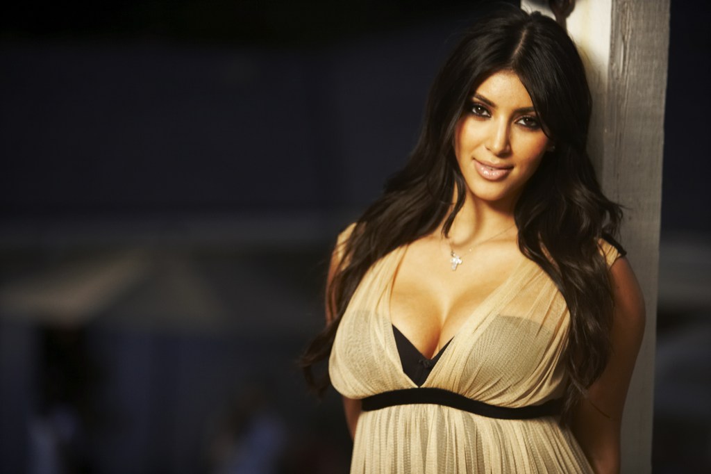 Kim Kardashian wearing a gold dress for "Keeping Up with the Kardashians."