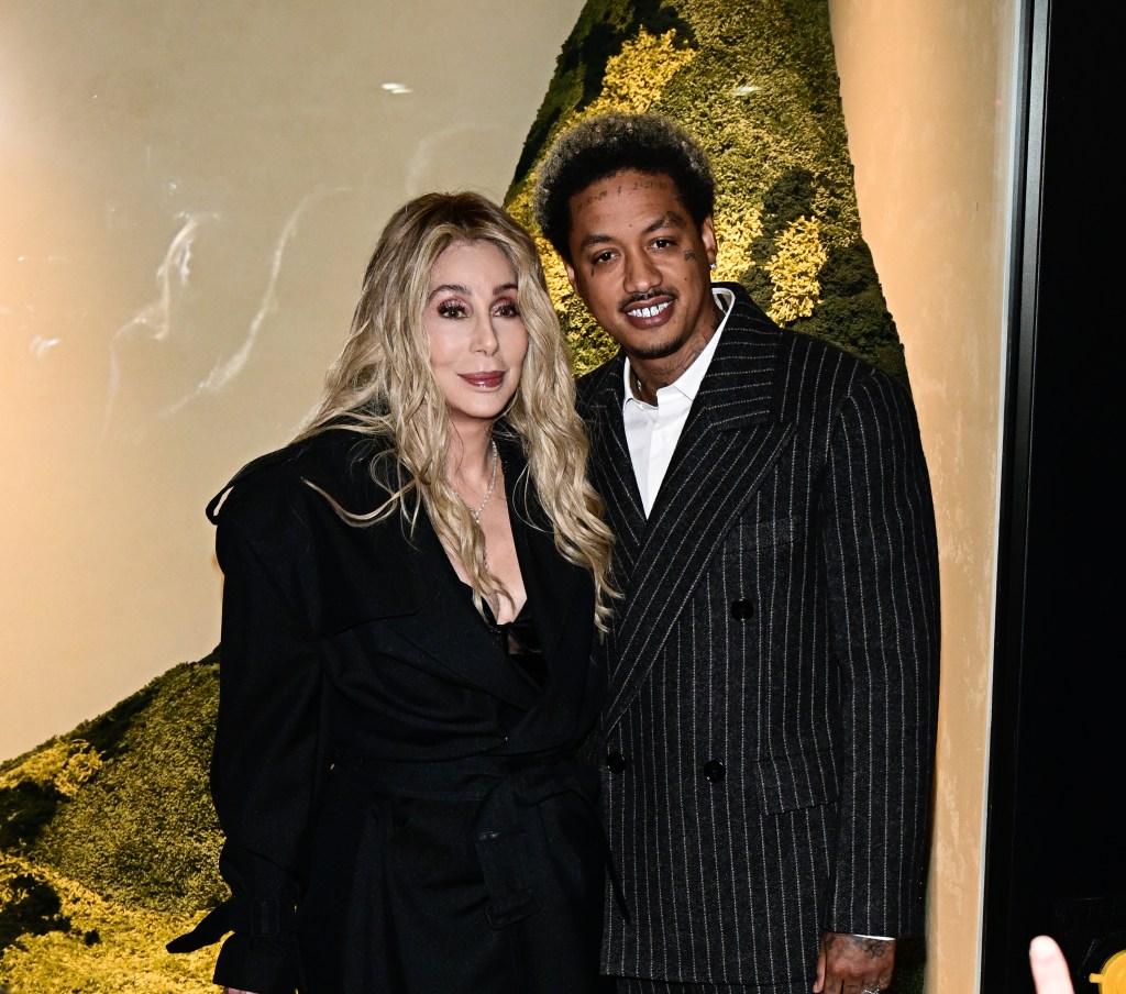 Cher and AE arrive at the grand reopening of the NY Burberry flagship store. (ALEXJR / BACKGRID)