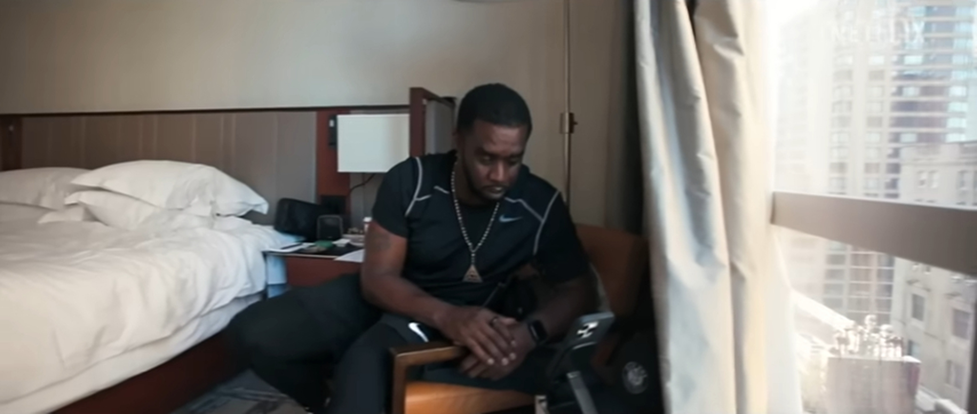 Sean Combs in a New York City hotel room, as seen in Netflix's trailer for 'The Reckoning.'