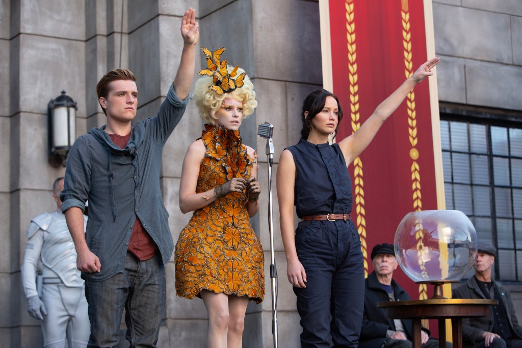 Josh Hutcherson, Elizabeth Banks, and Jennifer Lawrence on the set of The Hunger Games: Catching Fire in 2012.