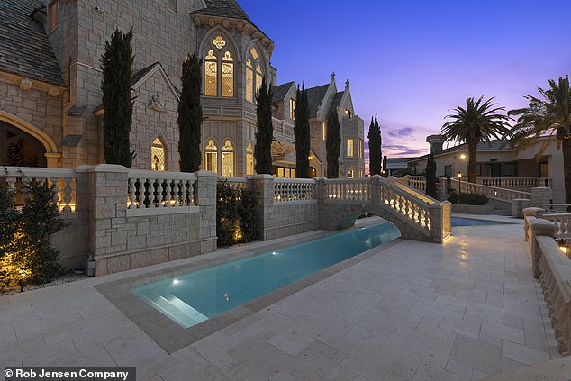 Saltwater pool and lakefront backyard at the Las Vegas estate