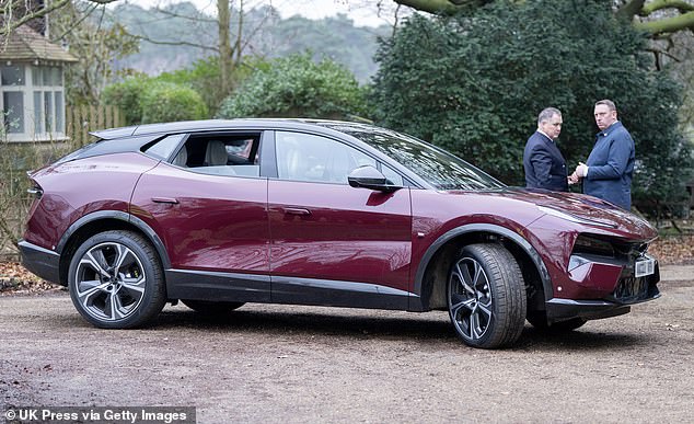 King Charles and Queen Camilla ride in their new electric Lotus Eletre at Sandringham