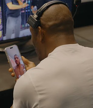 Anthony Joshua on a hospital video call with Kamaru Usman after the Lagos crash