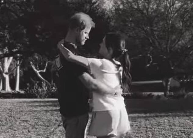 Meghan Markle can be seen dancing with her husband Prince Harry in a video filmed by their daughter Princess Lilibet