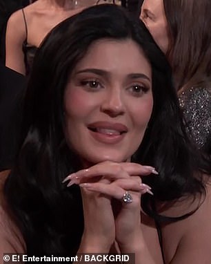 Kylie Jenner reacts as Timothee Chalamet thanks her during his speech