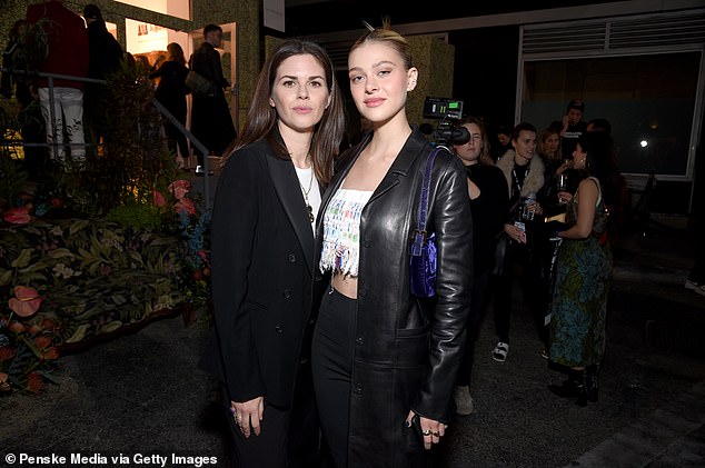 Nicola Peltz and Brooklyn Beckham amid conflicting accounts about whether Victoria Beckham pulled out of making the dress.