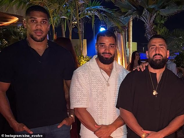 Anthony Joshua pictured with friends Latif Ayodele (center) and Sina Ghami (right), who died in the crash