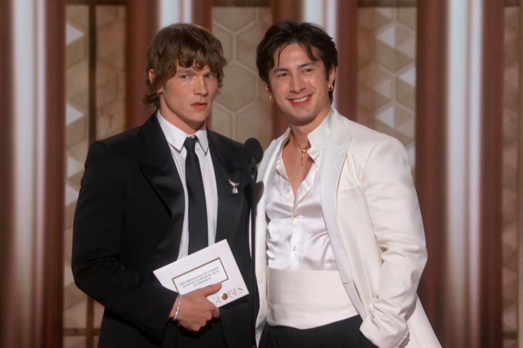 Connor Storrie and Hudson Williams at the 83rd Annual Golden Globes.