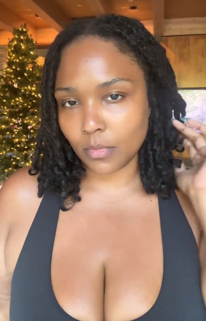 Close-up of Lizzo's new short, bouncy brown curls from her January 2026 TikTok reveal.