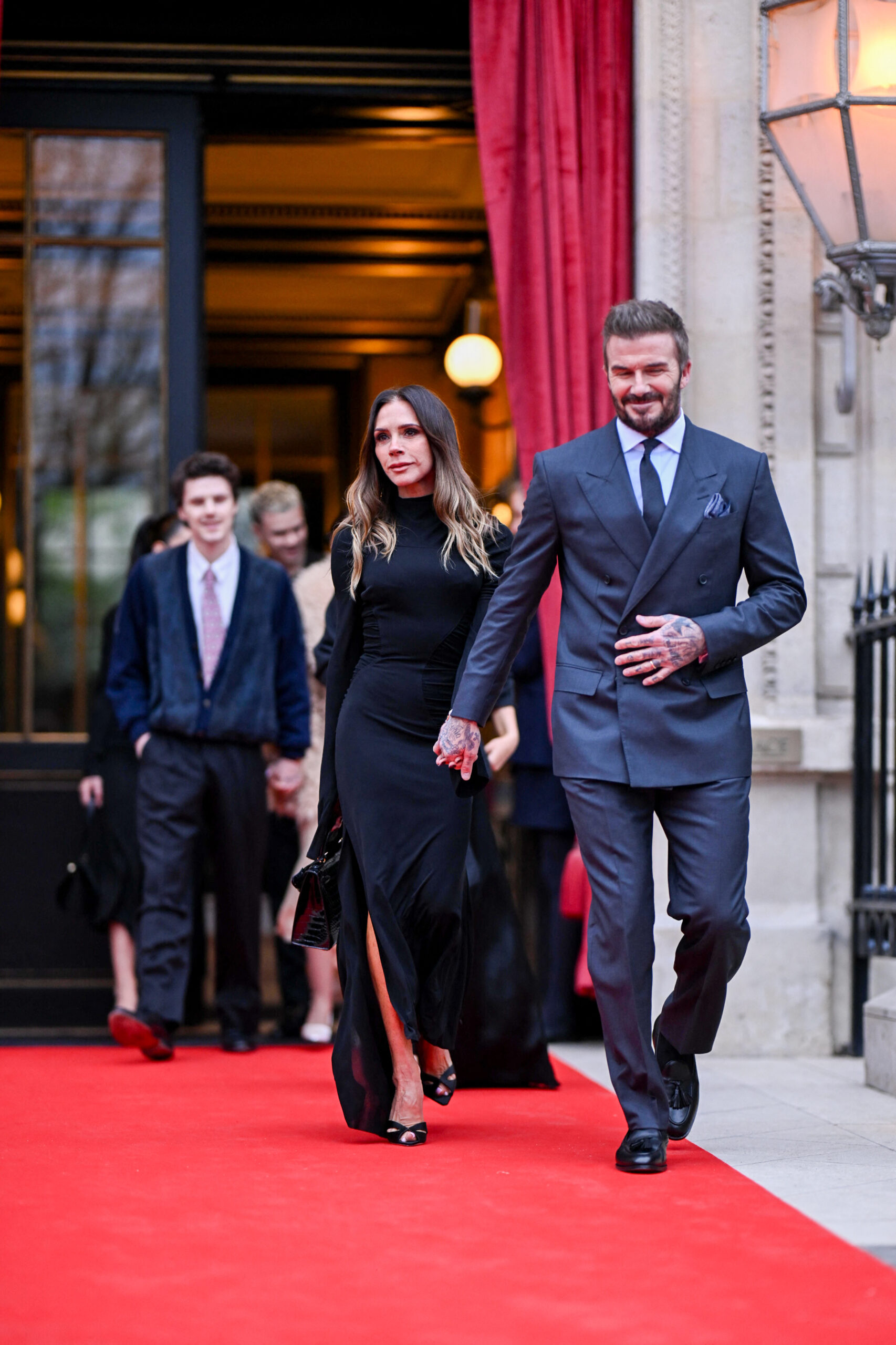 Victoria Beckham, accompanied by her family, leaves the Hotel La Reserve