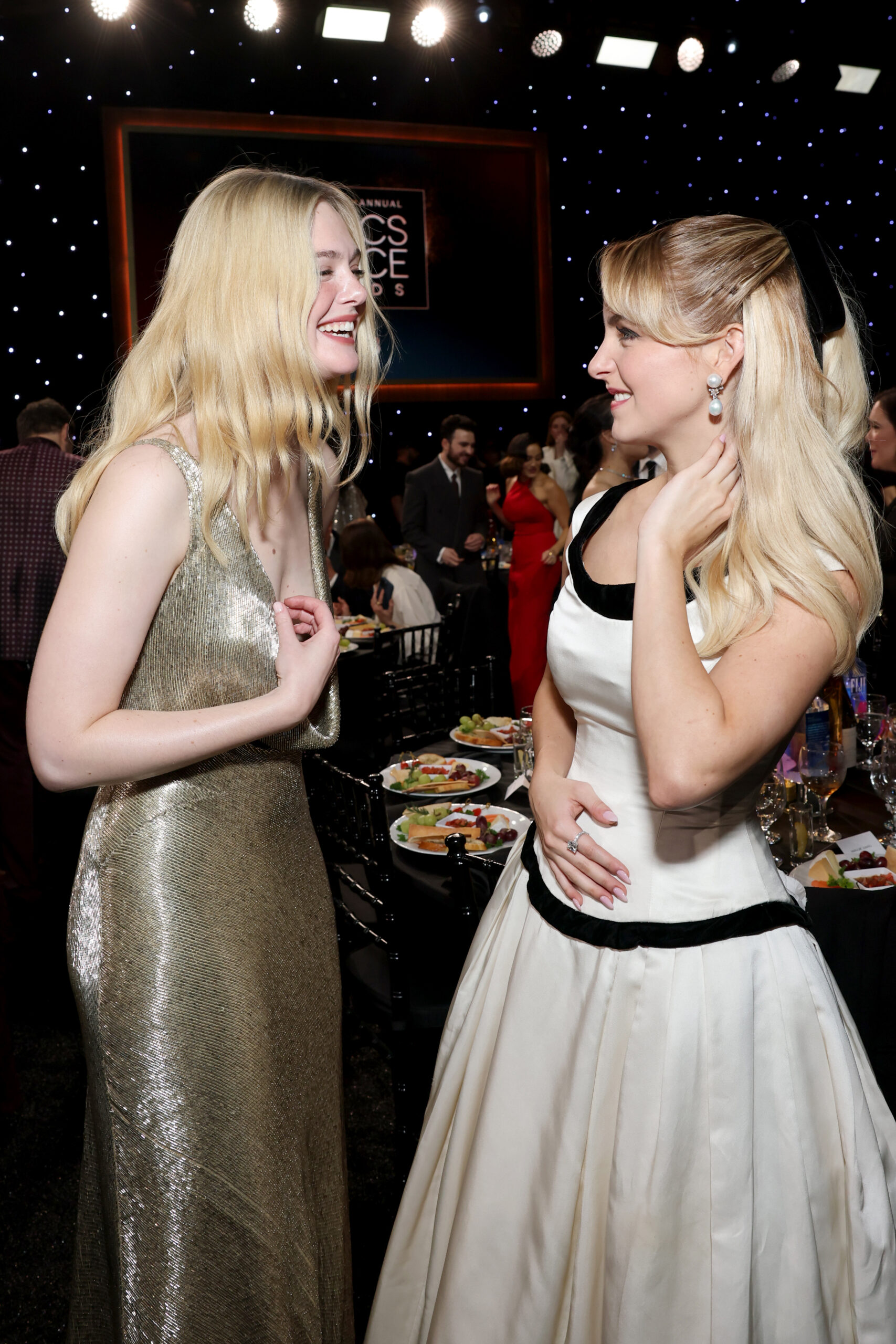 Elle Fanning and Mckenna Grace share a sweet moment during the 2026 Critics Choice Awards