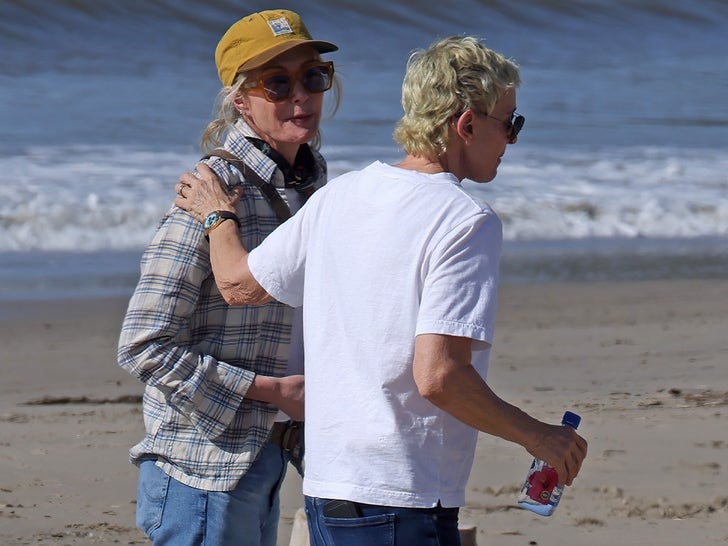 Ellen DeGeneres and Portia de Rossi walking along the beach while house hunting.