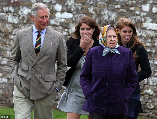 King Charles III with Princess Eugenie, Queen Elizabeth II, and Princess Beatrice