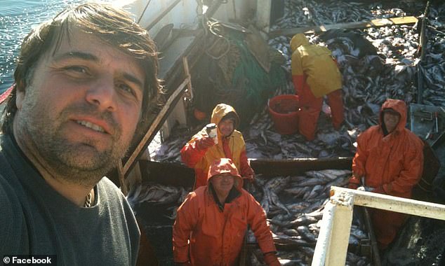 Accursio 'Gus' Sanfilippo was captain of the 72-foot fishing boat, named the Lily Jean, when it sank on Friday just before 7am as all seven onboard are identified - DailyMailUS