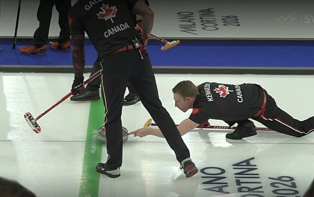 A disputed moment where Kennedy appears to maintain light contact as the stone reaches the hog line