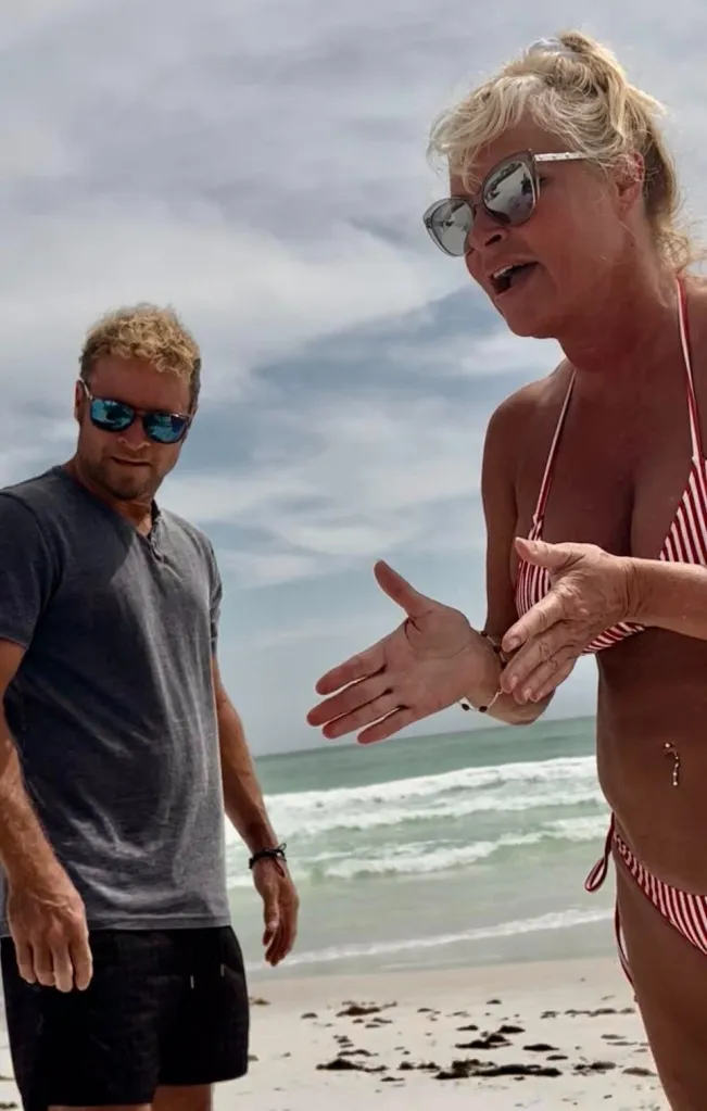 Brian and Leighanne Littrell speaking with beachgoers outside their Florida home.