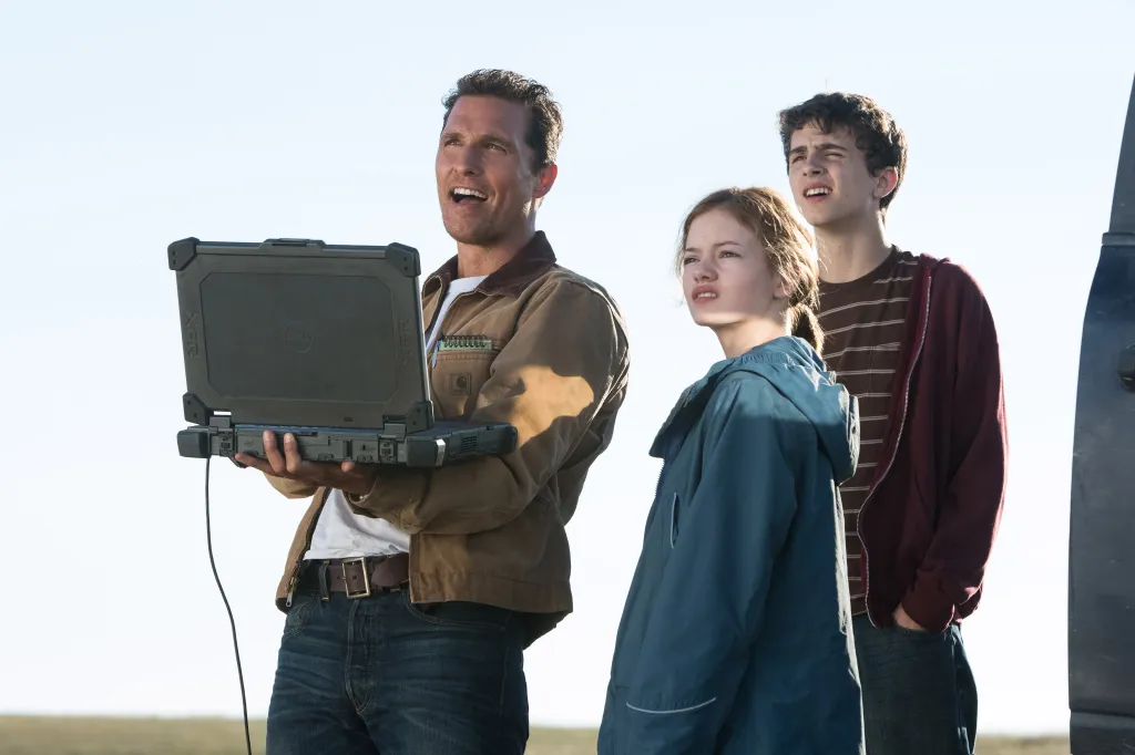 Interstellar (2014) still featuring Matthew McConaughey with young Tom, played by Timothee Chalamet.