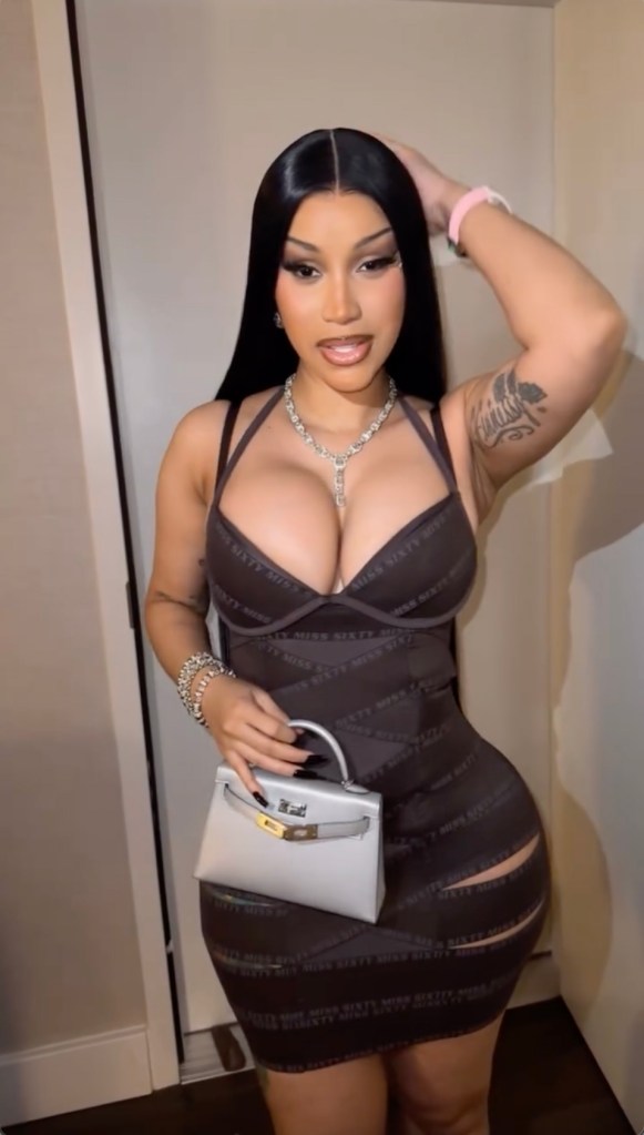 Cardi B in a Miss Sixty mini dress with a silver mini bag during Super Bowl weekend.