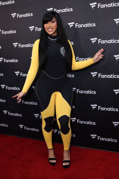 Cardi B in a black-and-yellow Chrome Hearts scuba suit at the Fanatics Super Bowl party.