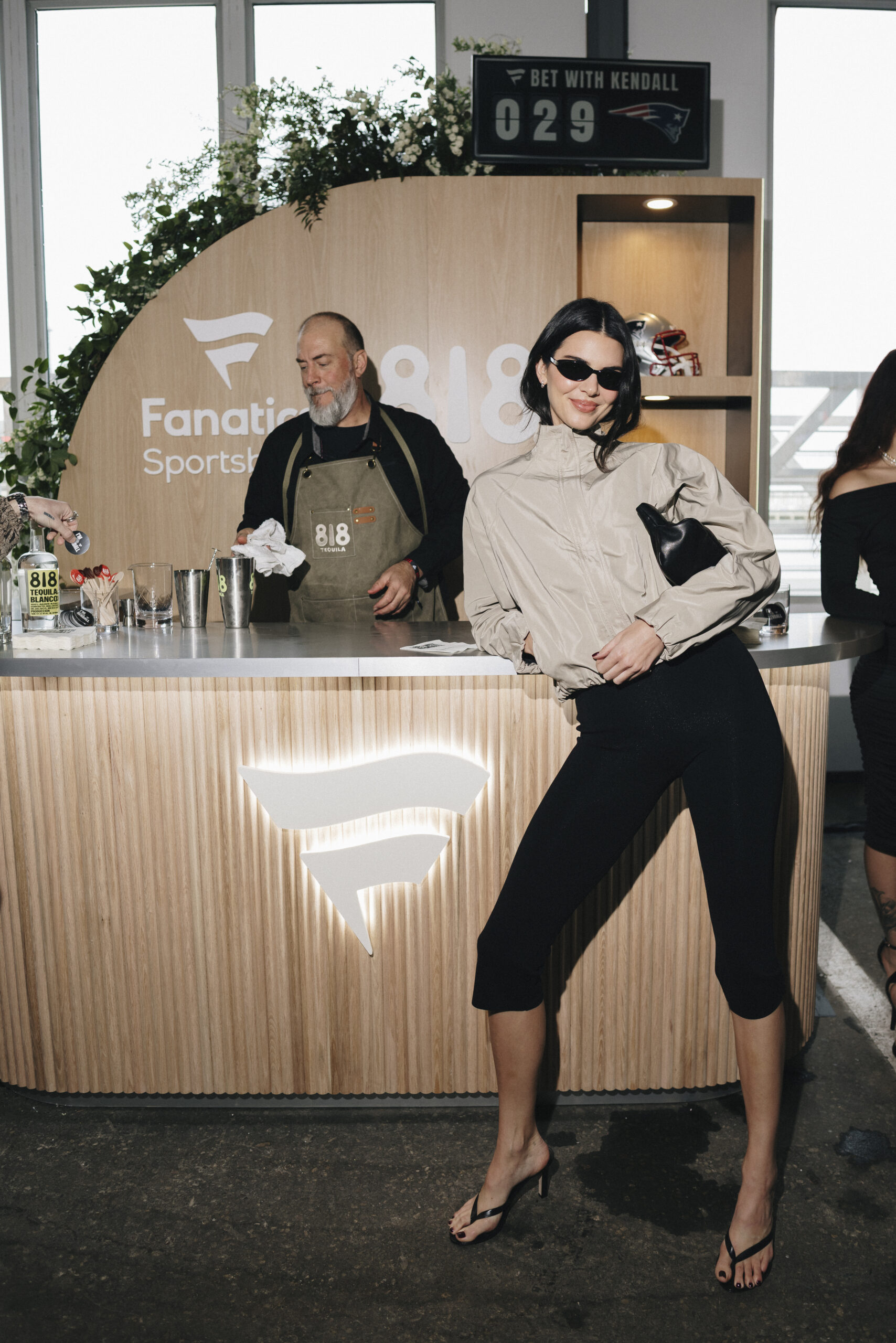 Kendall Jenner at an 818 Tequila bar inside the Fanatics Super Bowl 2026 party.