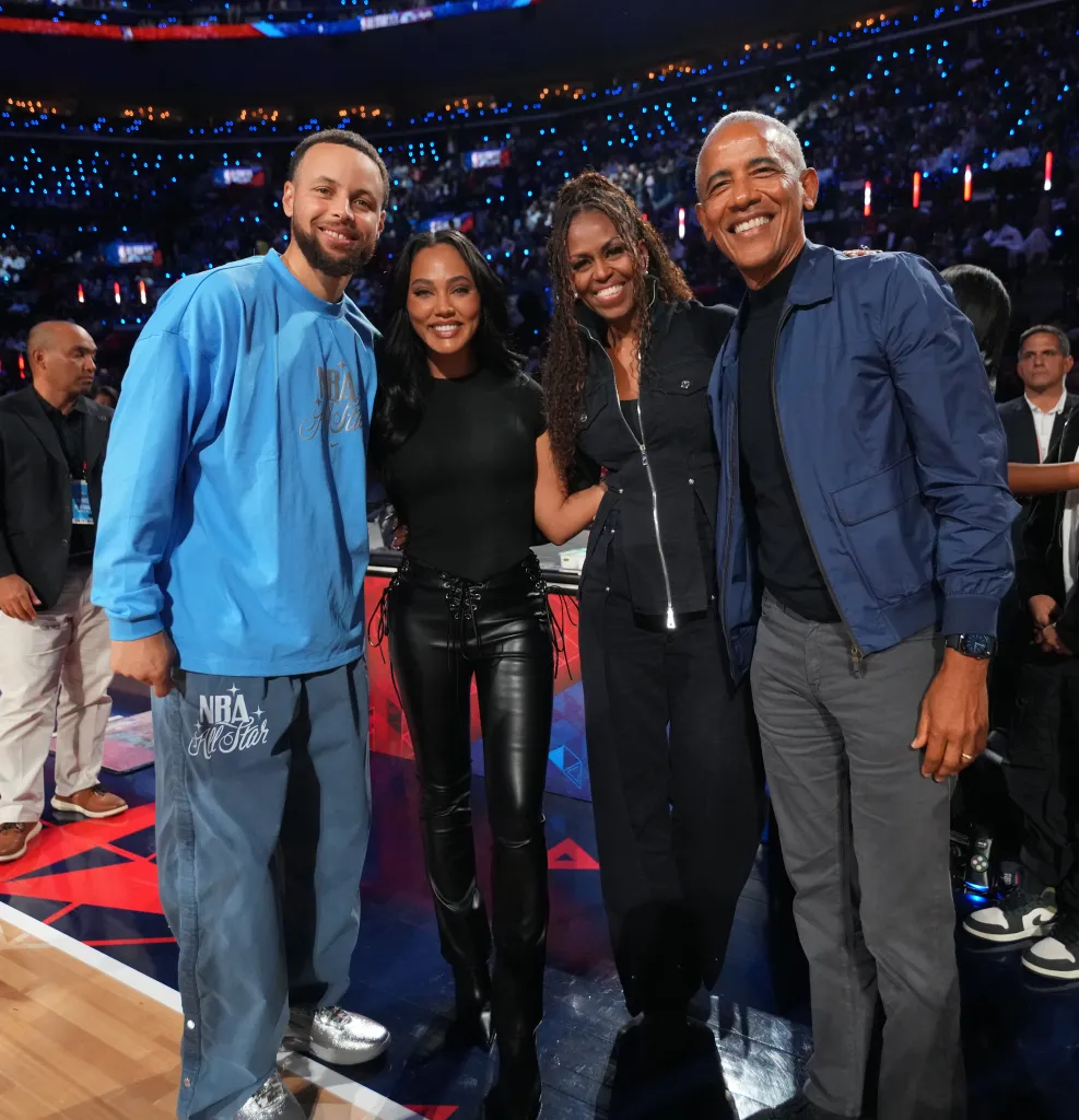 Barack and Michelle Obama pose with Stephen Curry and Ayesha Curry during NBA All-Star Weekend.