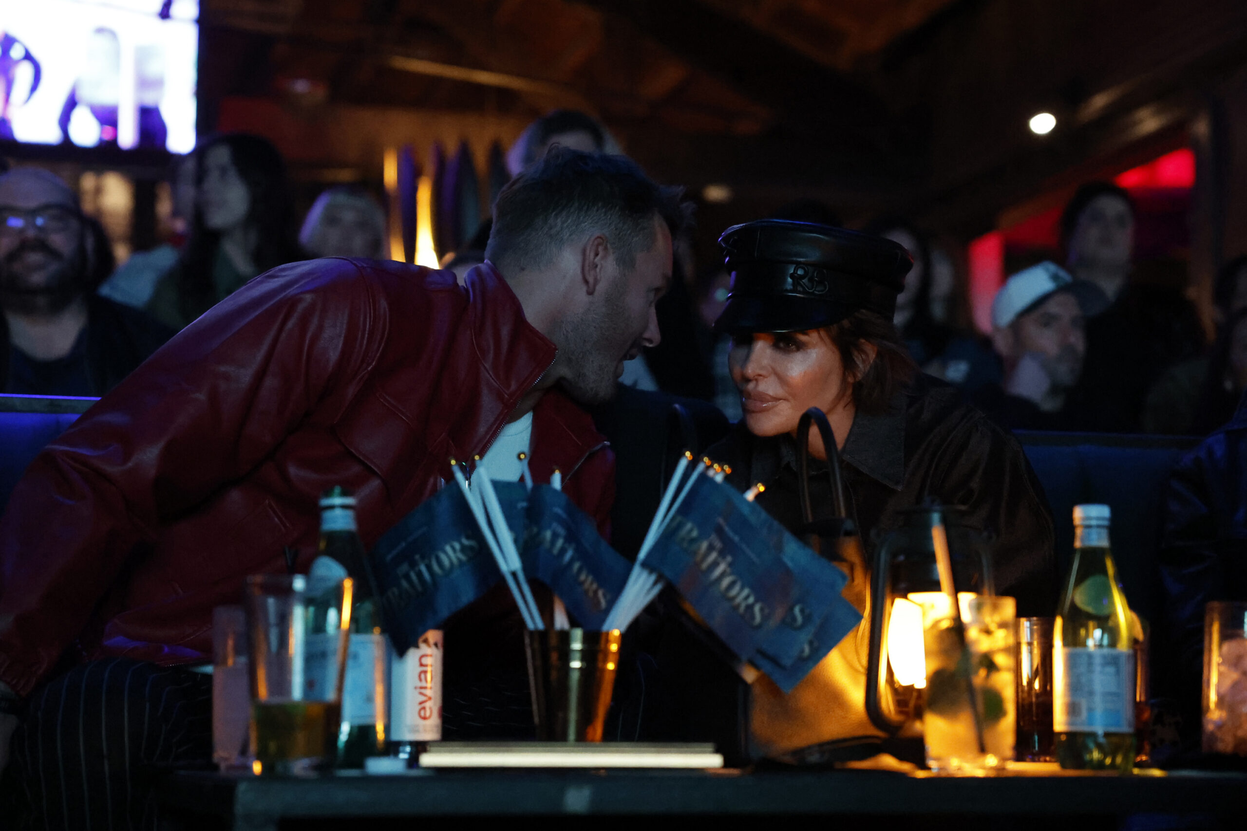 Colton Underwood and Lisa Rinna at The Traitors Season 4 premiere watch party.