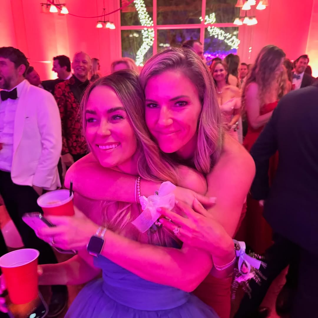 Lauren Conrad embraces a friend at her 'Senior, Senior Prom' 40th-birthday bash.