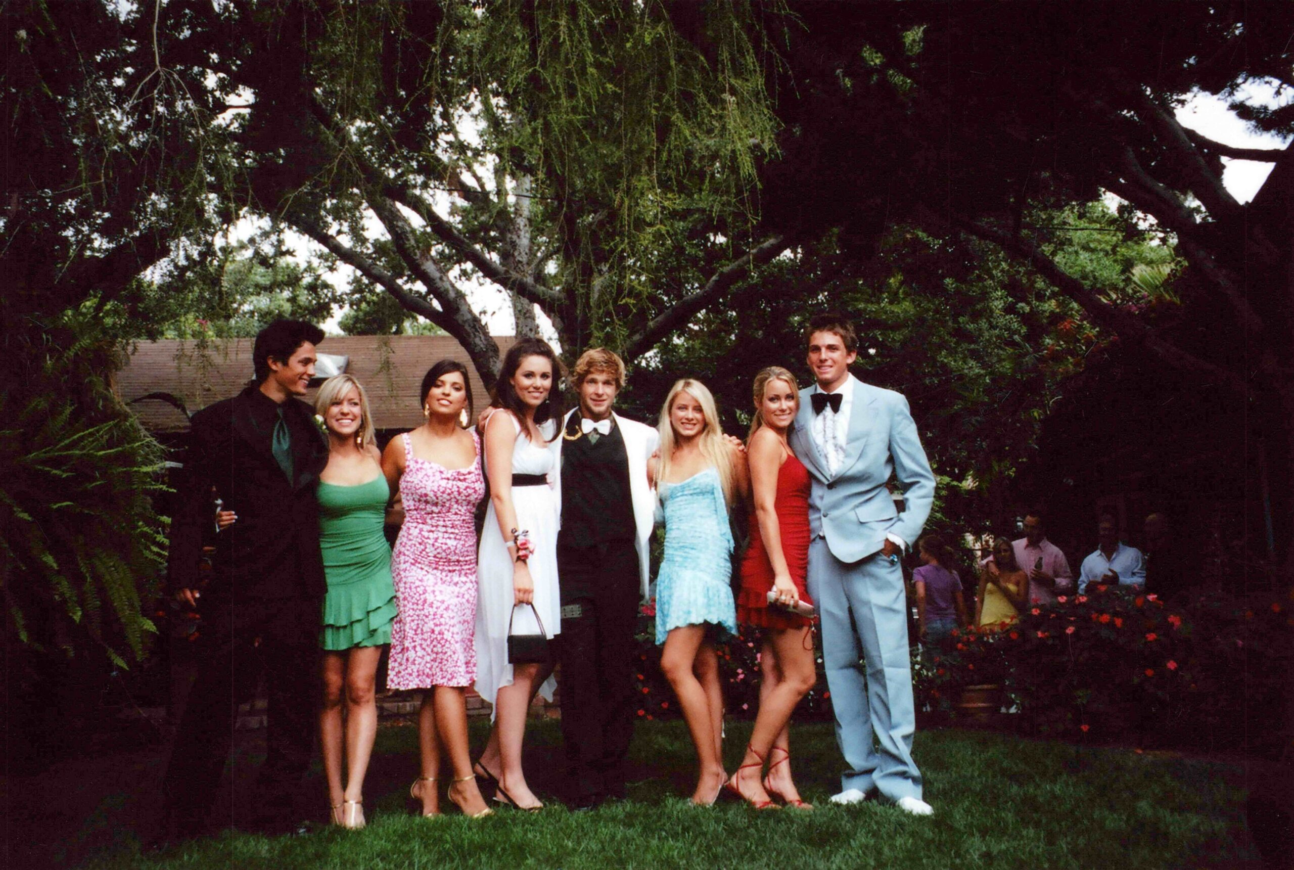 Laguna Beach High School reunion attendees posing together in a group photo.