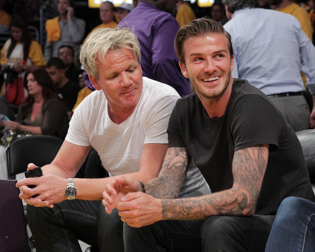 Gordon Ramsay and David Beckham watching a basketball game.