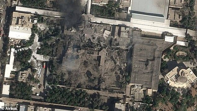 Satellite image shows smoke and damage at a Tehran compound associated with Iran's supreme leader after reported strikes