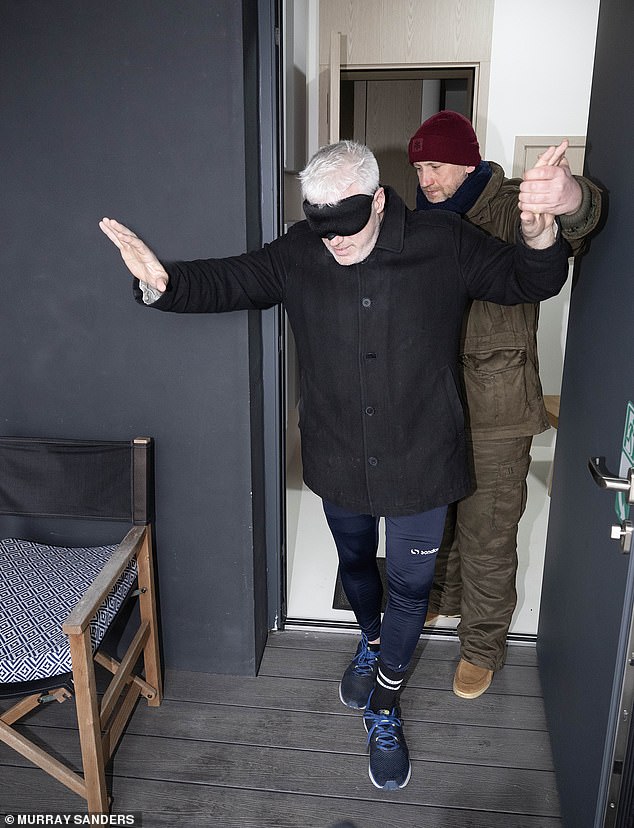 Emerging from a hillside darkness pod at the Polish retreat.