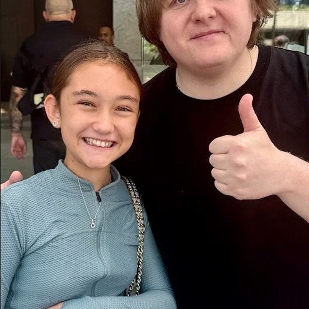 Jude Law's ex thanked Lewis Capaldi for his 'kindness' after he posed for a snap with the actor's daughter on Sunday, following her upsetting run-in with Chappell Roan - Daily Mail US