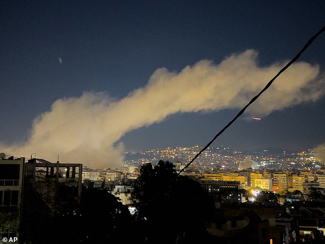 Smoke rises over Beirut's Dahiyeh after reported Israeli airstrikes amid evacuation warnings