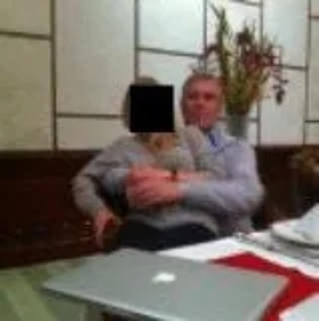Image circulating in media said to show a man resembling Prince Andrew seated closely with a young woman; faces redacted. Provenance unverified as of publication.